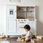 White and gold wooden kids kitchen with sink, cupboards and storage shelves